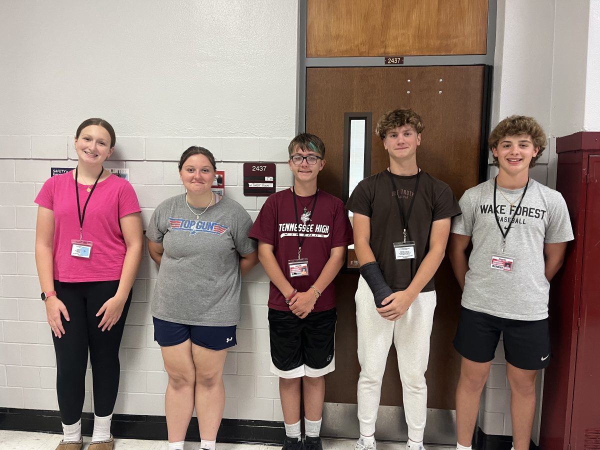 AP Human Geography students Angelina DiBartolo, Bella Jones, Connor Stout, Nathan Sells, & Connor Stallard posing outside of the study room.