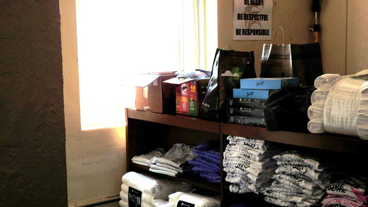 Stacks of toiletries line the walls of the hygiene room.