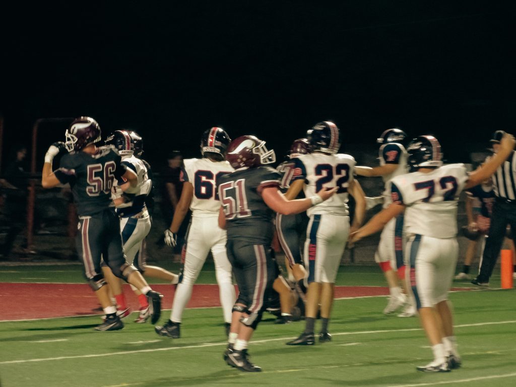 After scoring, the Vikings jump in the air with excitement / Photo by Hayden Arnett