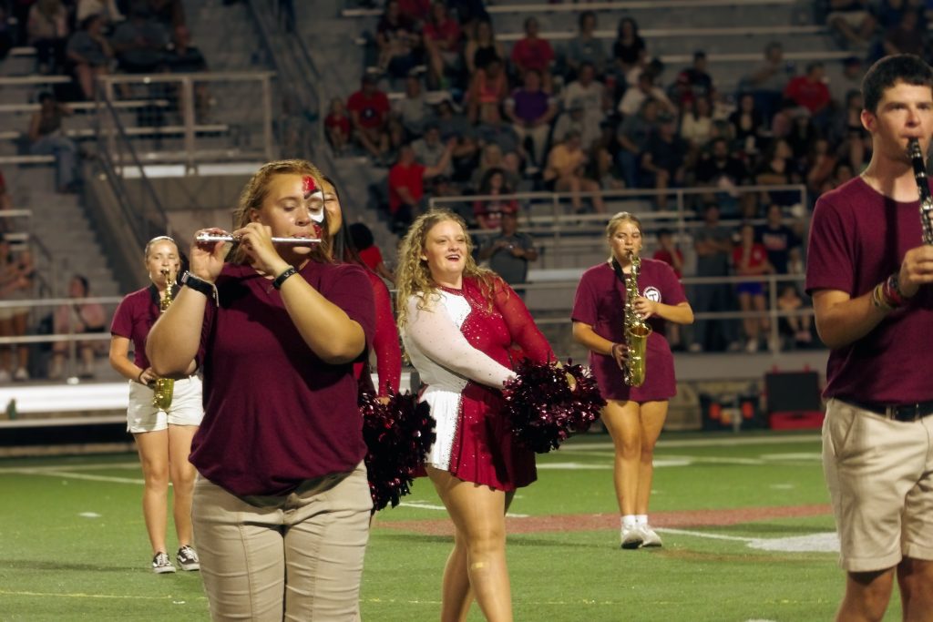 Kara Gobble dances jovially to "Come Together." during the half time performance.