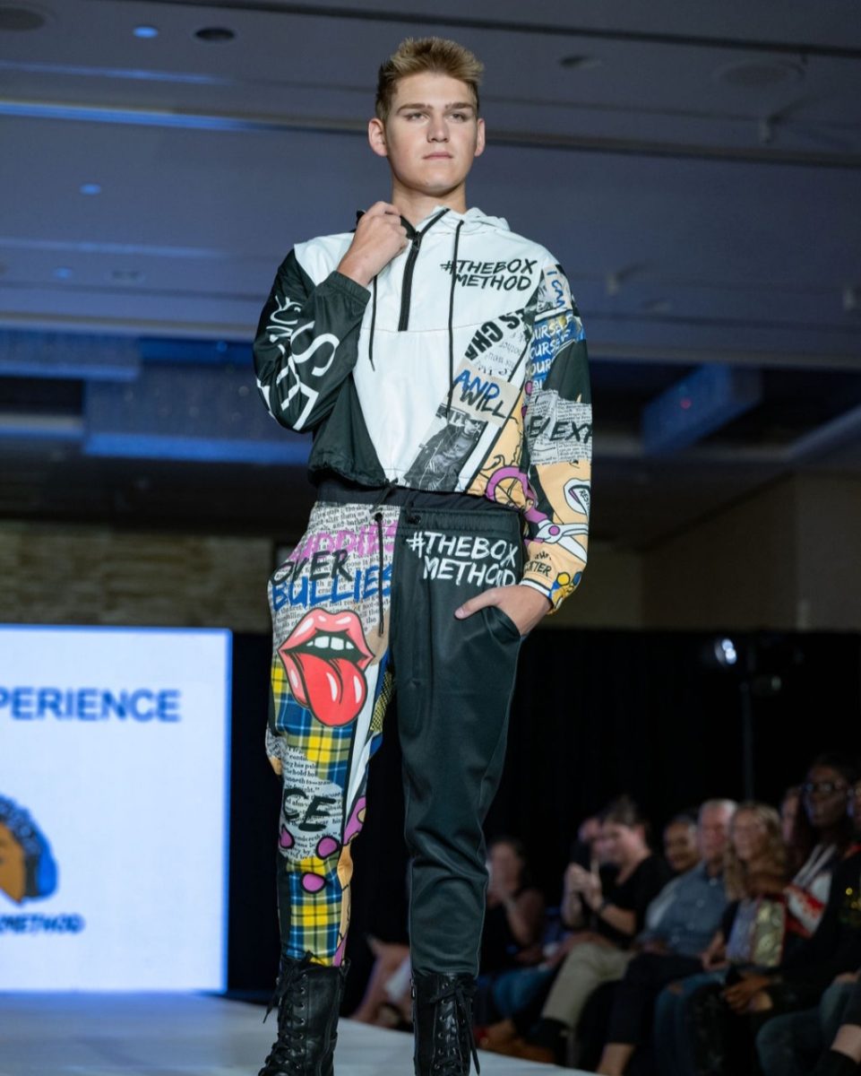 Jacob Boyd walking the runway during New York Fashion week.