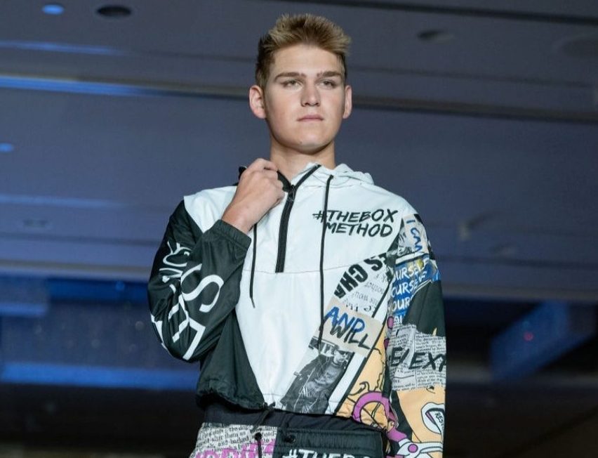 Jacob Boyd walking the runway during New York Fashion week.