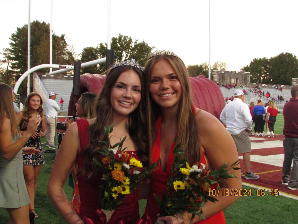 Freshman Carlie Harmon (left) and her older sister, senior Aubrie Harmon (right), both won Homecoming Princess for their grades.