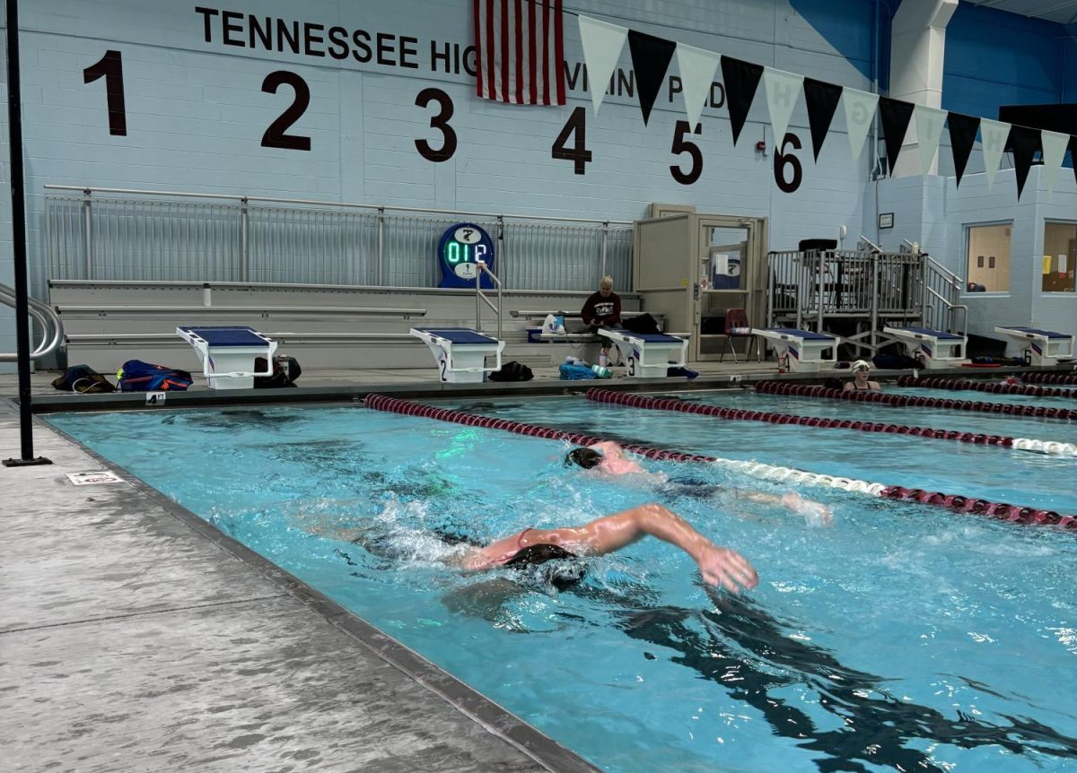 Simon Hutchinson (right) and Cayden Williams (left) during swim practice.