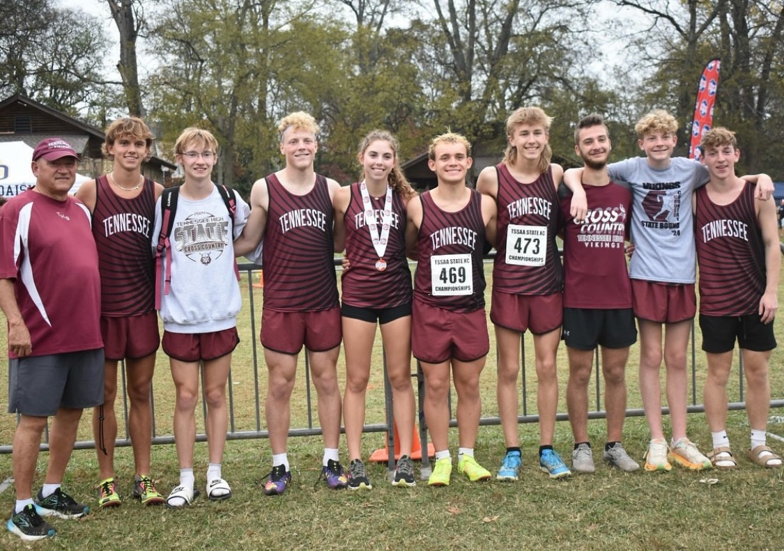 The Cross Country team stands together after running at the state meet in Hendersonville, Tennessee. 

Pictured from left to right: Coach Frankie Nunn, Carter Romans, Ryder Poole, Noah Broglio, Jenna Reecher, Ryan Fish, Andrew Sells, Jude Childress,  Connor Broglio, Gavin Lamie.