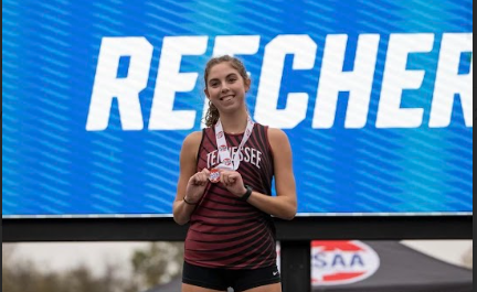 Jenna Reecher places 15th at the cross country state meet, earning a spot on the podium. 