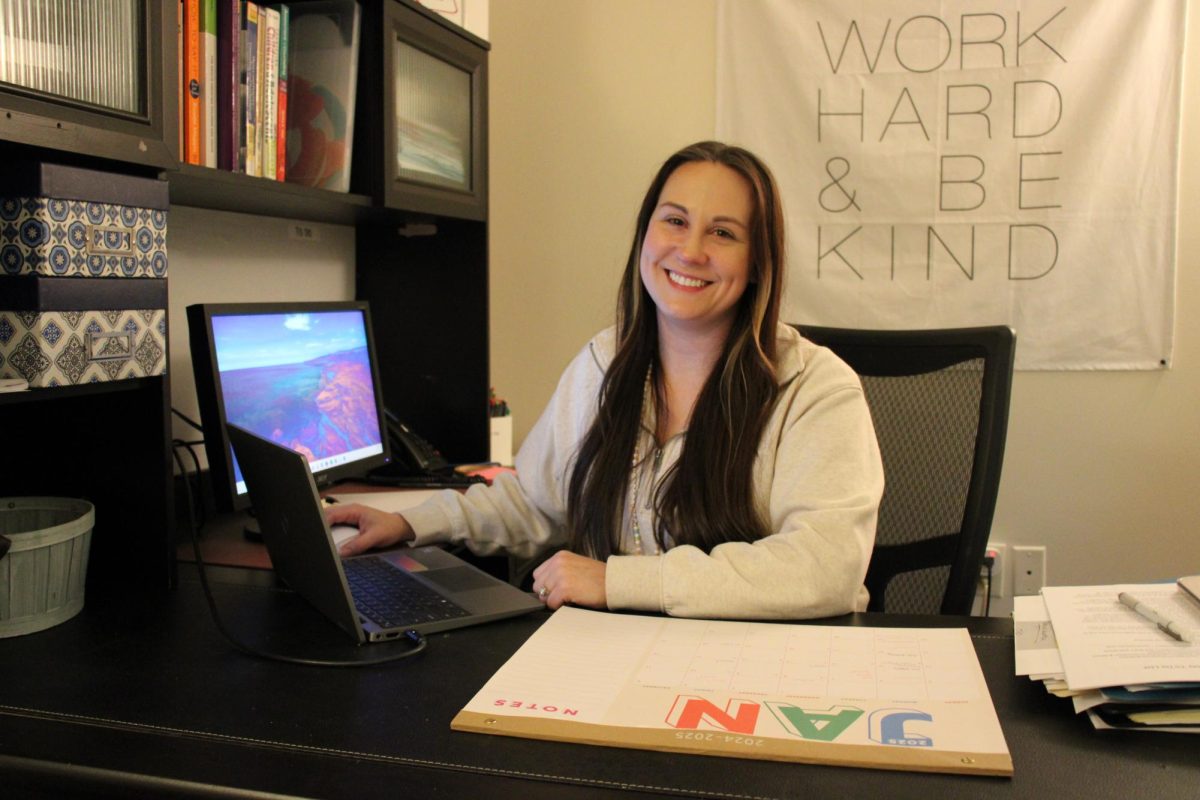 Counselor Brittany Slagle working in her nearly empty office as she prepares to leave THS.