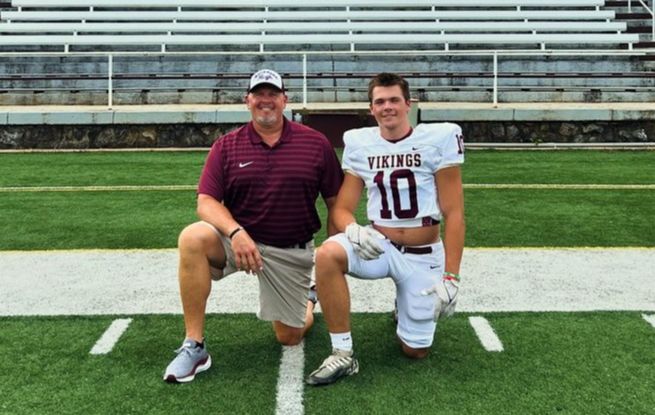 Coach Derek Dowdell (left), pictured with his son, senior Trent Dowdell (right). (Photo courtesy of Eddie Gray)