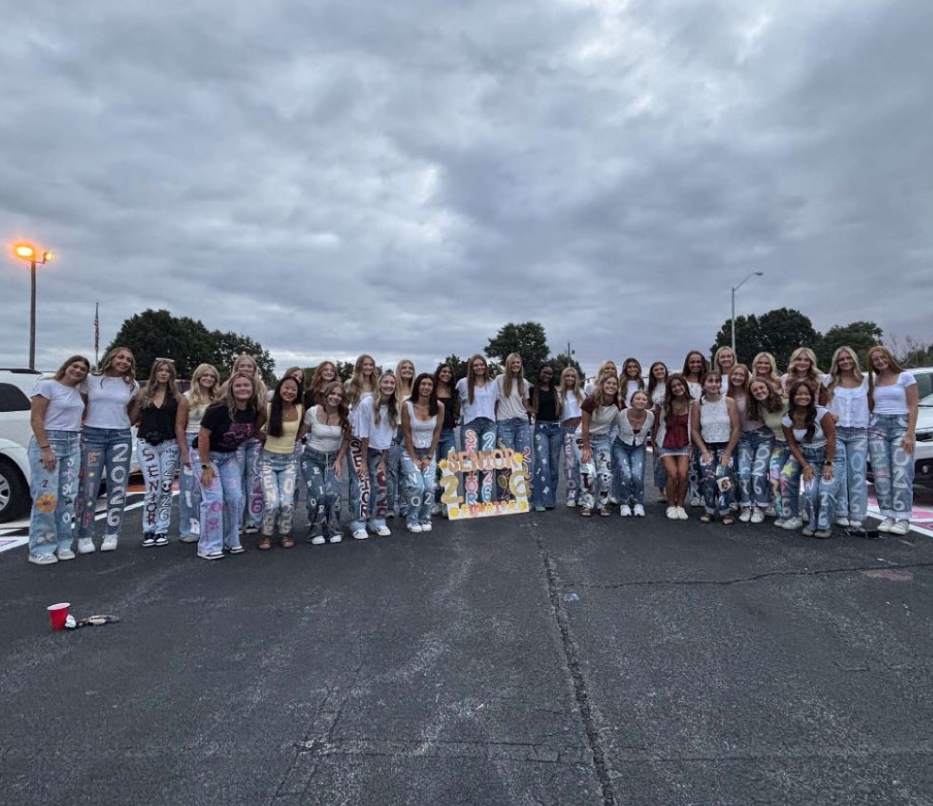 A group of senior girls gather for a photo on the first day of school.