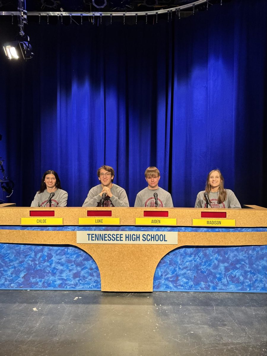 The Scholar's Bowl starters sitting just prior to the start of the match.
Left to right: Senior Chloe Whitt, Captain Senior Luke Sah, Sophomore Aiden Smith, Senior Madison Davis.