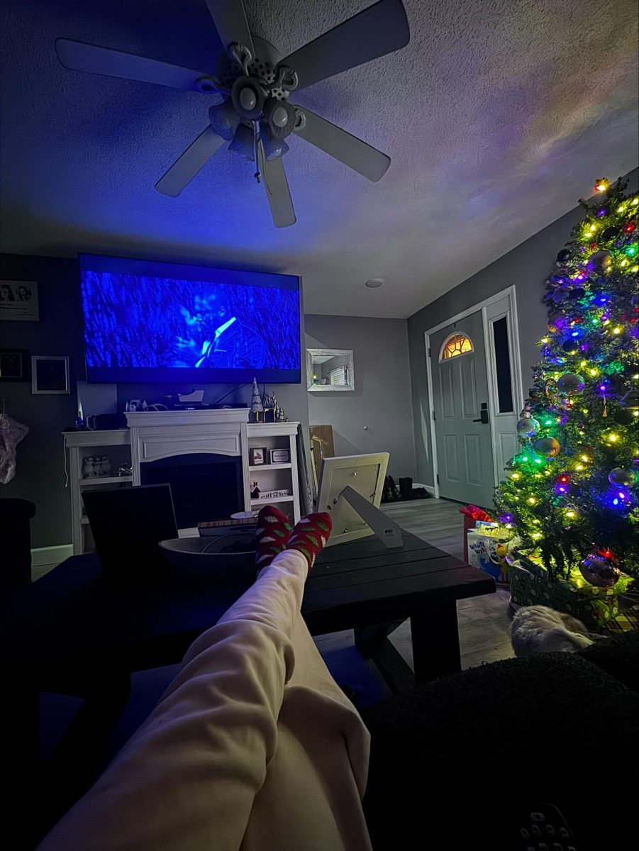 This is me relaxing and enjoying "Meet Me Next Christmas," as my Christmas tree lights up.