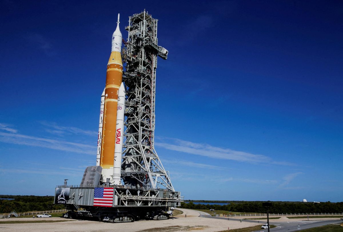 NASA's next-generation moon rocket, the Space Launch System (SLS) rocket with the Orion crew capsule, rolls to the launch pad at the Kennedy Space Center in Cape Canaveral, Florida, U.S. January 17, 2026. Launch around the moon and back is scheduled for February 6, 2026. REUTERS/Joe Skipper