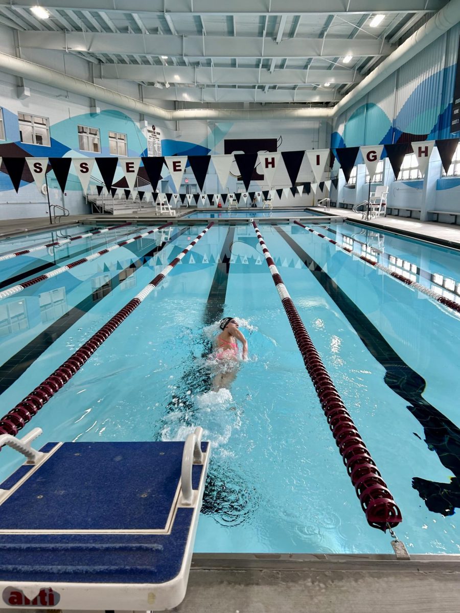 Freshman "Vivie" Murphy practices swimming laps in preparation for the State swim meet.