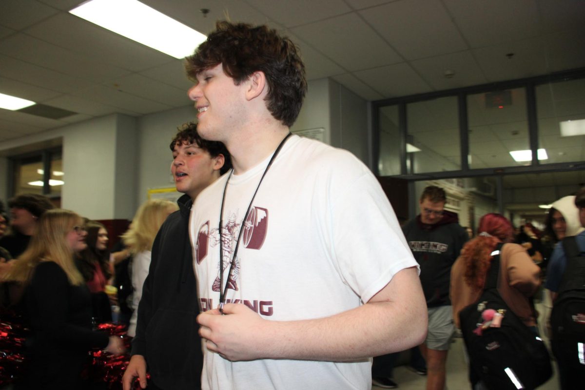 Junior, Spencer Miller who won 6th place in heavy weight category, during the wrestling walkout.