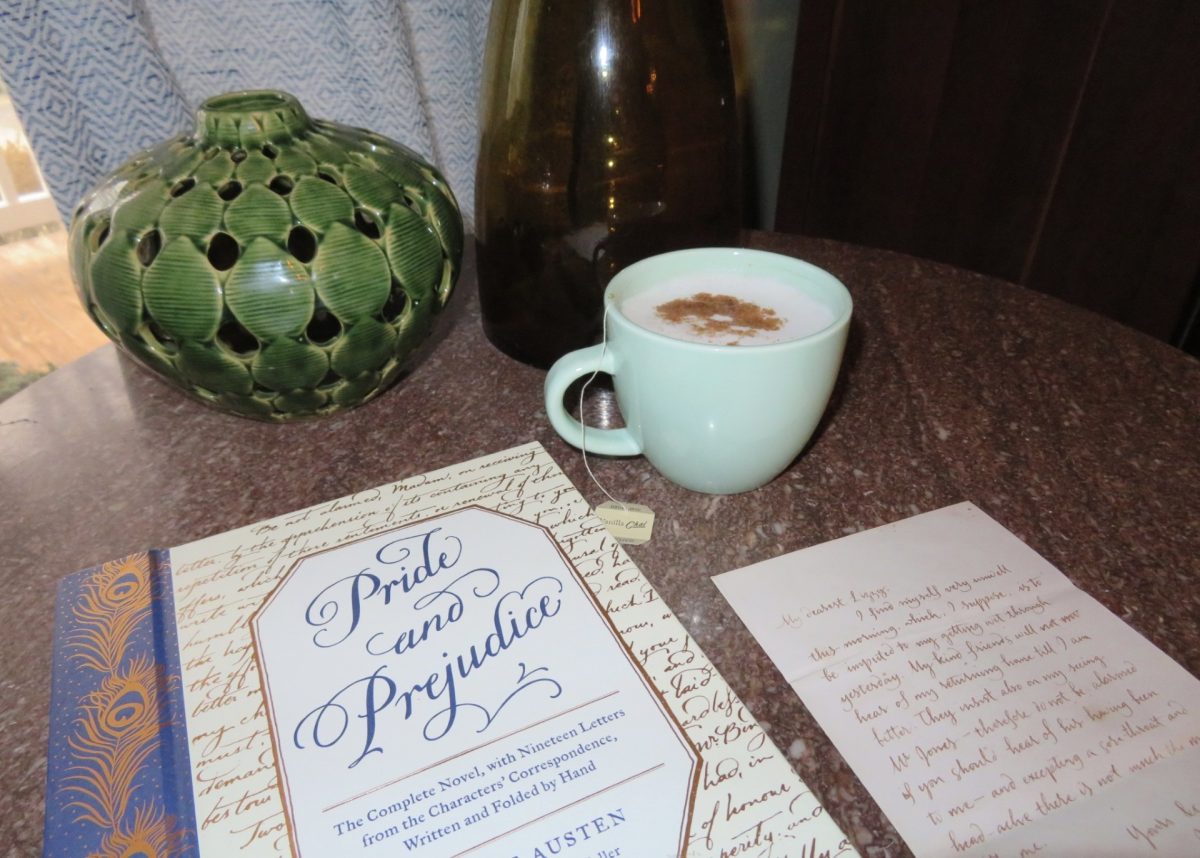 Pride and Prejudice novel featuring letters from character correspondence, alongside my favorite tea.