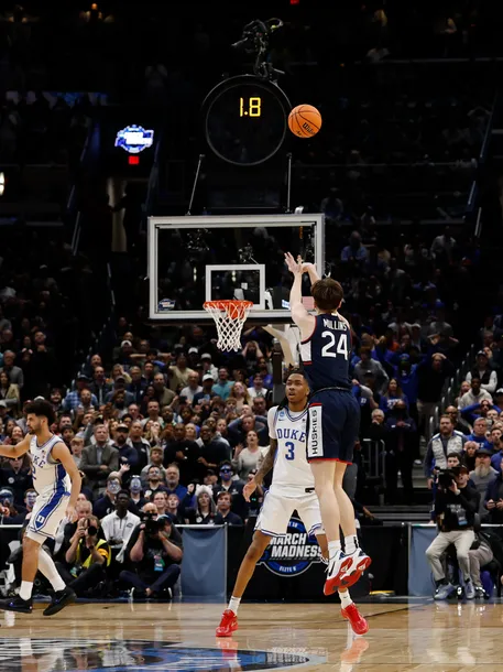 Connecticut's Braylon Mullins (No. 24) shooting his game-winning 3-pointer against Duke.