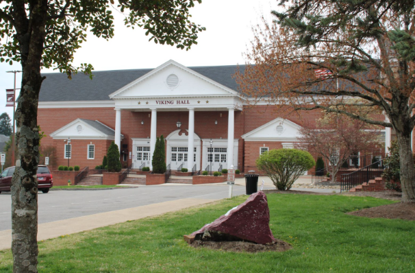 Blooming plants and trees in front of Viking Hall display hopeful and visible signs of spring.