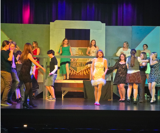 The cast of Emma had rehearsal on stage in the Tennessee High auditorium before their first performance.